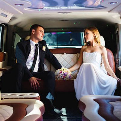 Party Bus Vs. Limousine For Weddings in Chicago Wedding Transportation